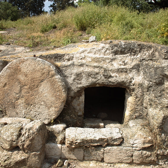 Christ's tomb with the stone rolled over the entry Backdrop