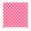 Pink background with white heart pattern media wall