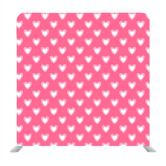 Pink background with white heart pattern media wall